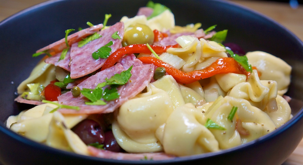 Mar 17: The Country Deli; Muffuleta Pasta Salad with Cheese Tortellini