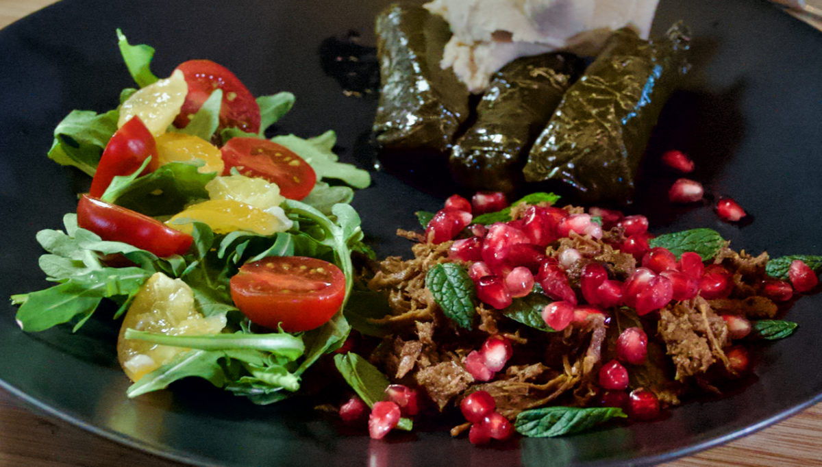 Oct 19: Warm Shredded Lamb Salad with Dolmas topped with Hummus, and an Arugula, Cherry Tomato, Mint and Preserved Lemon Salad